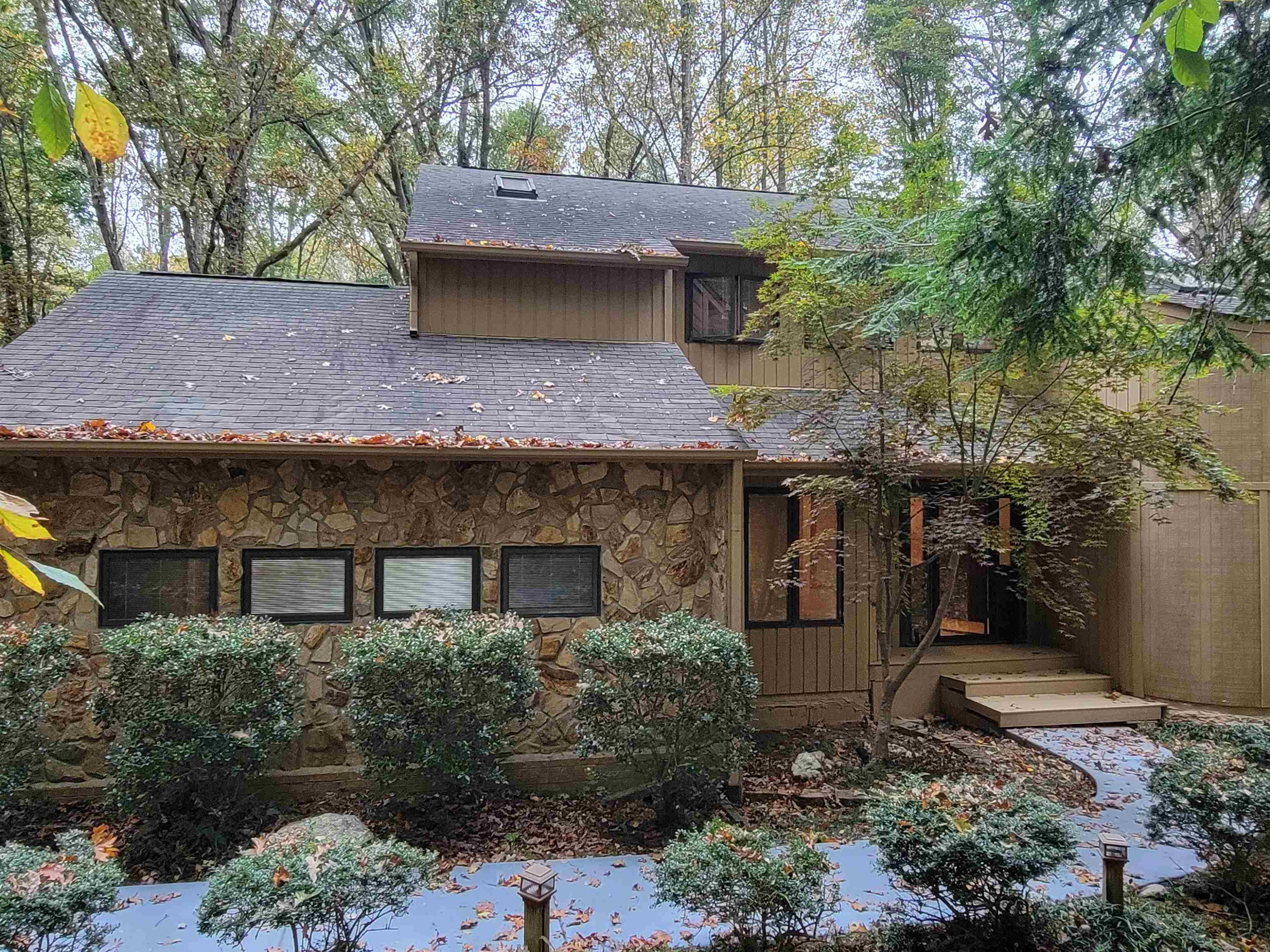 7816 Netherlands Drive Raleigh, NC 27606 - Photo 55 of 60 a front view of a house with a garden