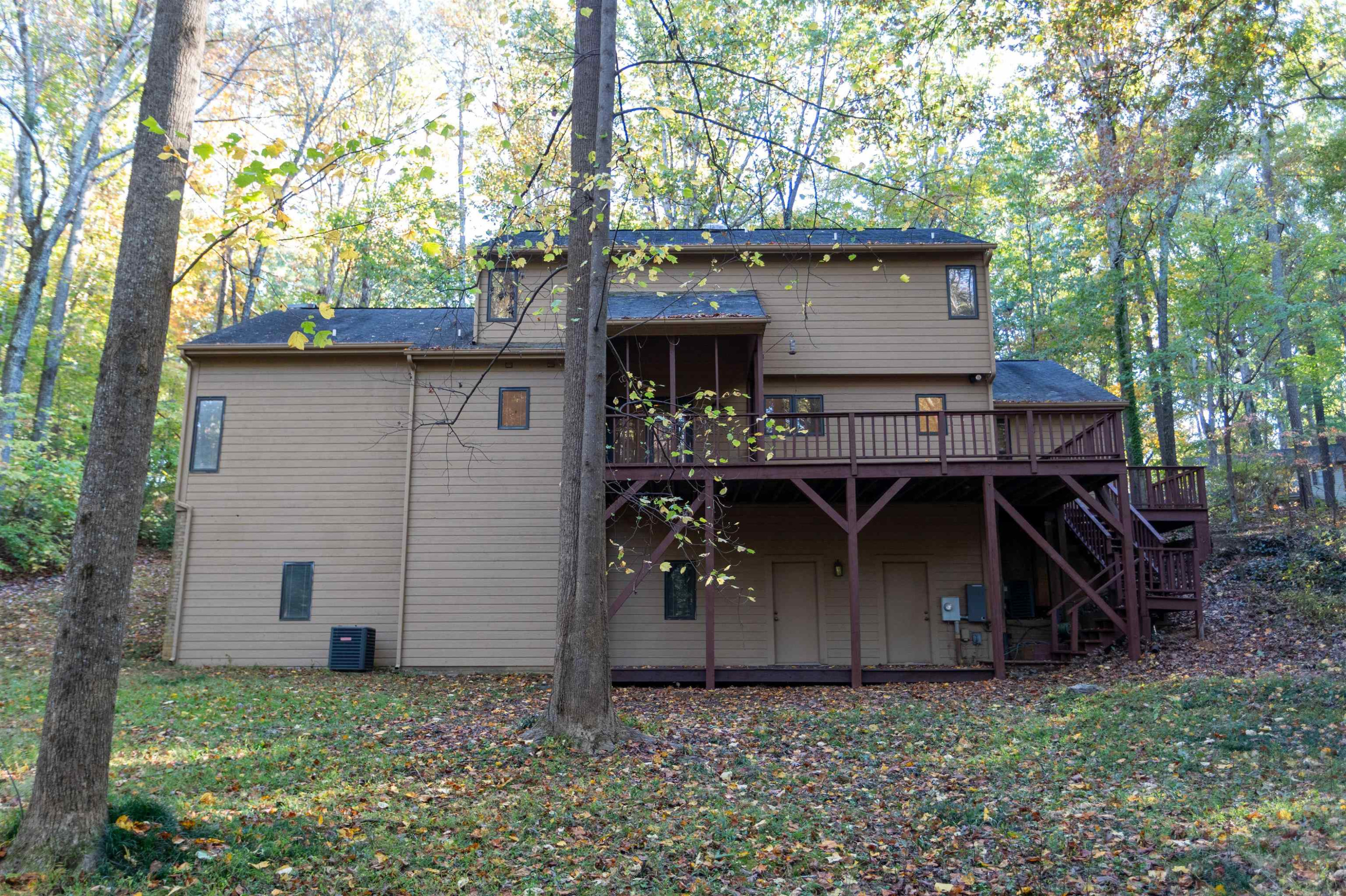 7816 Netherlands Drive Raleigh, NC 27606 - Photo 57 of 60 a view of a house with a yard and sitting area