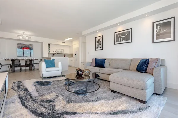 a living room with furniture and a table