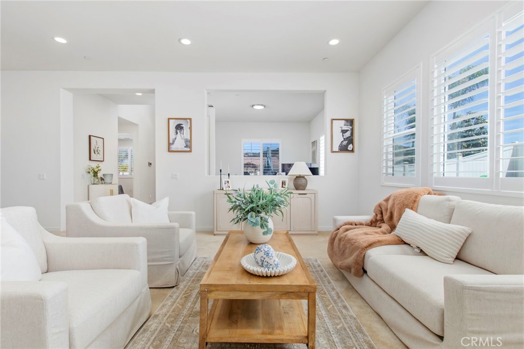 32797 Hayden Road Menifee, CA 92584 - Photo 12 of 51 a living room with furniture and a table