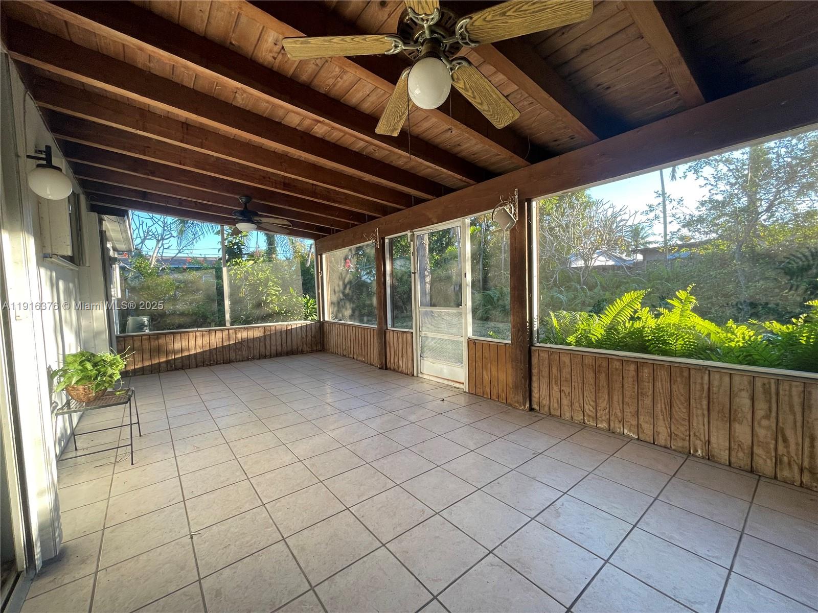 19700 Whispering Pines Road Cutler Bay, FL 33157 - Photo 19 of 27 a view of a room with wooden floor