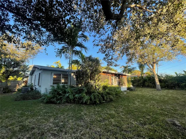 a view of house with outdoor space