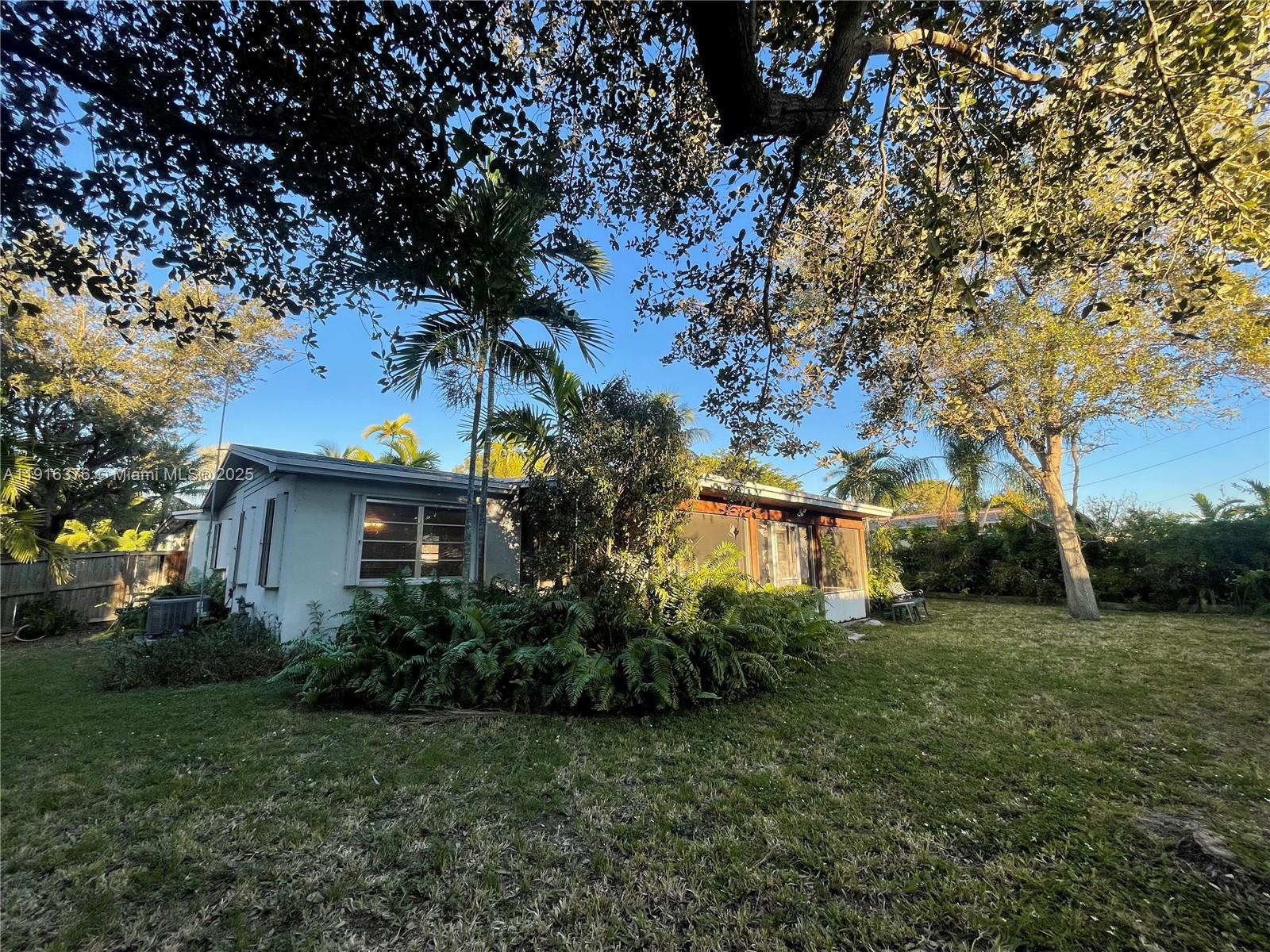 19700 Whispering Pines Road Cutler Bay, FL 33157 - Photo 20 of 27 a view of house with outdoor space