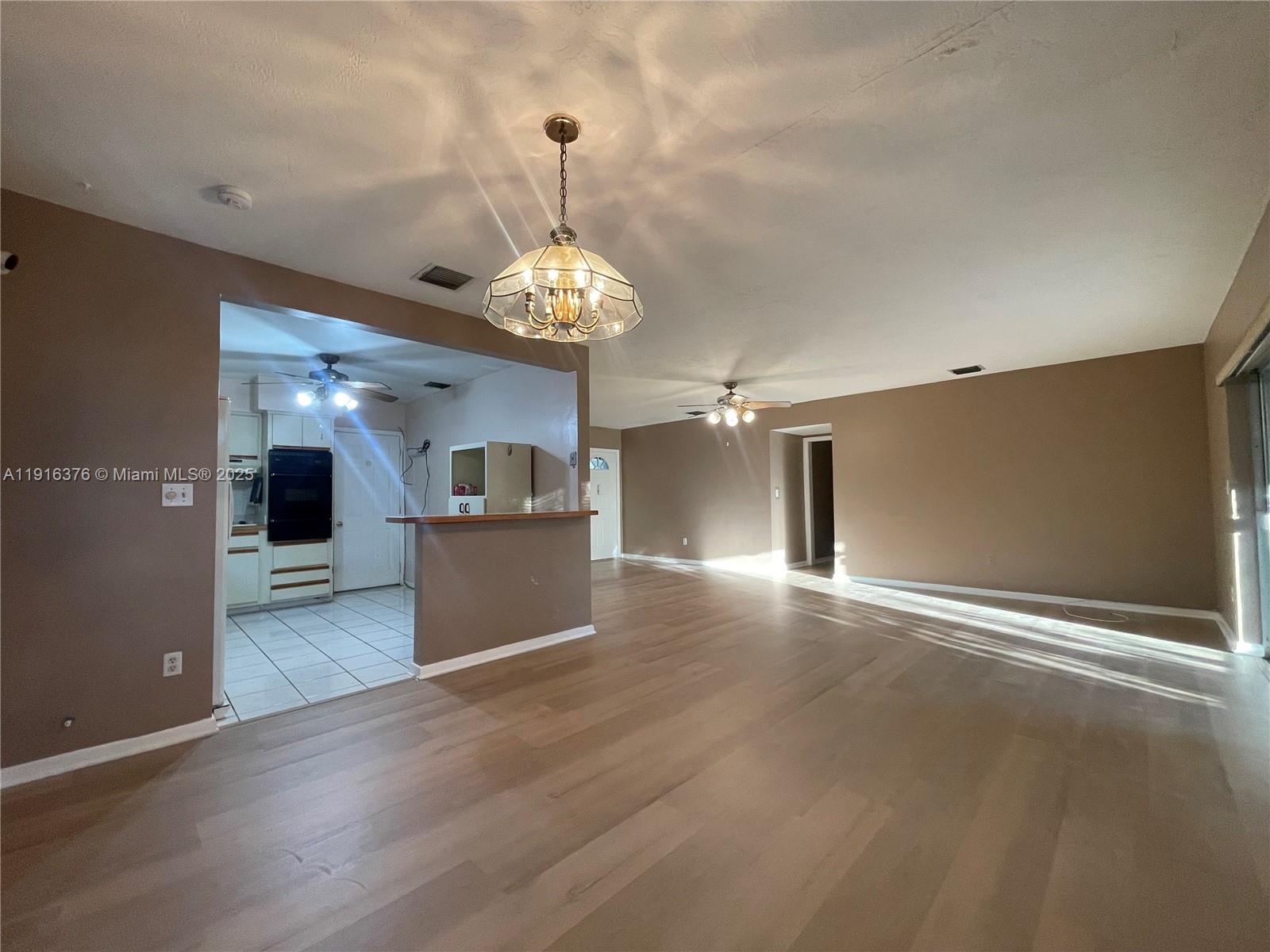 19700 Whispering Pines Road Cutler Bay, FL 33157 - Photo 7 of 27 a view of a kitchen with a sink and dishwasher in kitchen
