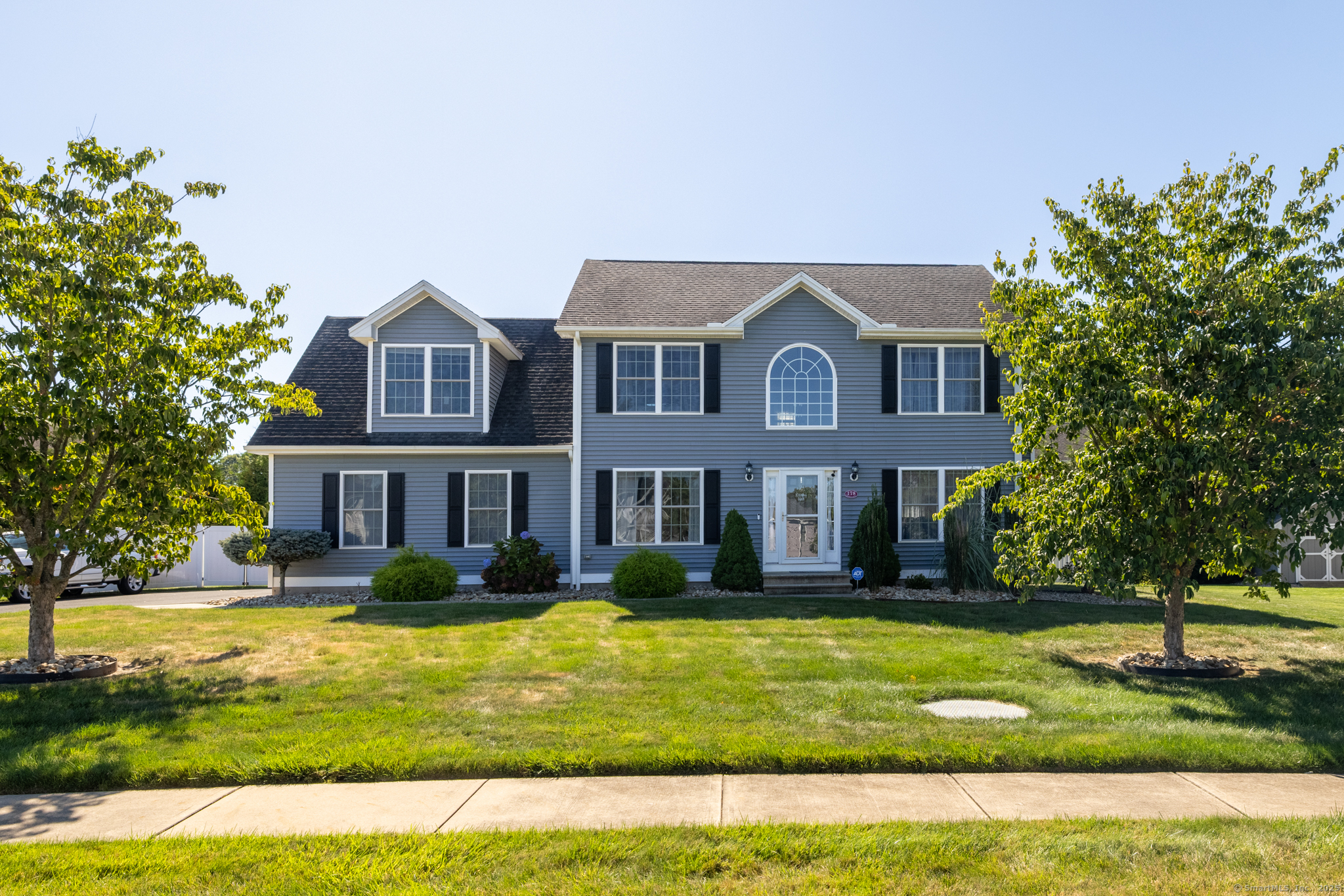 178 Empress Drive Southington, CT 06489 - Photo 1 of 1 a front view of a house with a yard