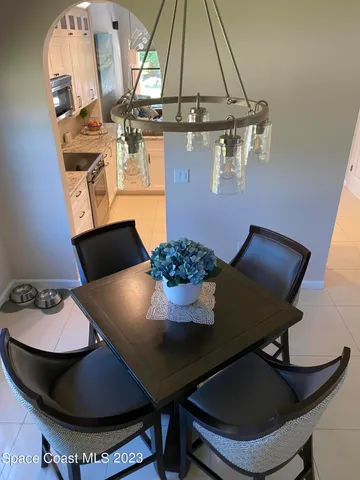 a living room with a sink and a window