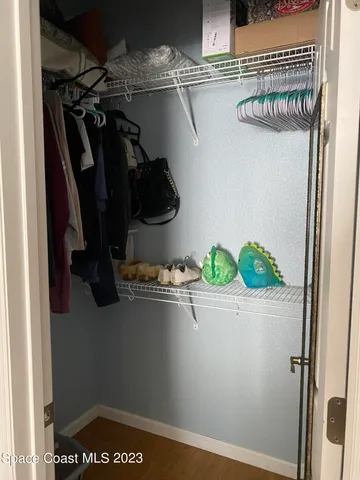 a house view with swimming pool and furniture