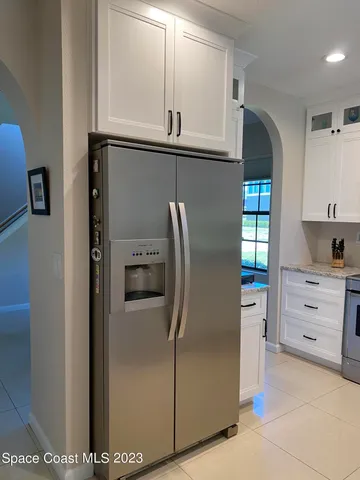 a view of cabinets and window