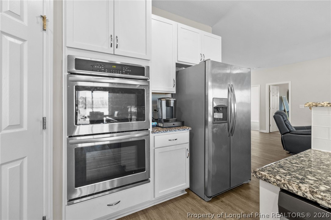 3298 Deep Branch Road Lumberton, NC 28360 - Photo 14 of 41 a kitchen with a stove microwave and refrigerator