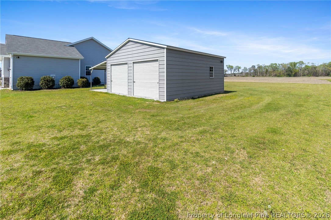 3298 Deep Branch Road Lumberton, NC 28360 - Photo 40 of 41 a view of an house with backyard space