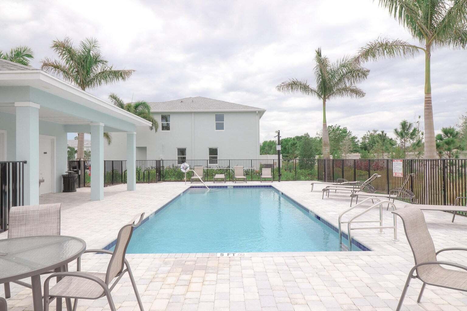357 Southeast Angler Drive Stuart, FL 34994 - Photo 24 of 25 a view of a patio with swimming pool