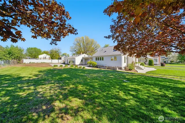 a view of a house with a big yard