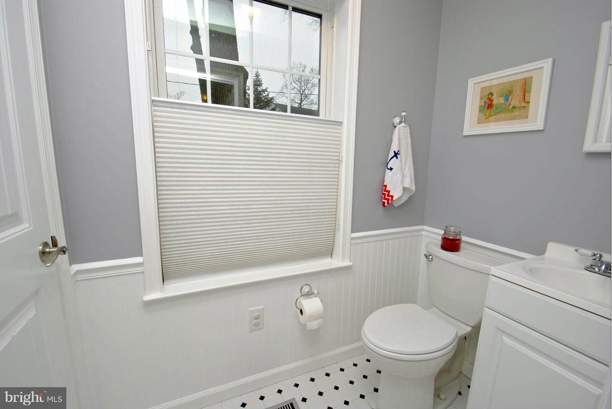 8366 Country Life Road Pasadena, MD 21122 - Photo 17 of 30 Wainscoted Main Level Half Bath