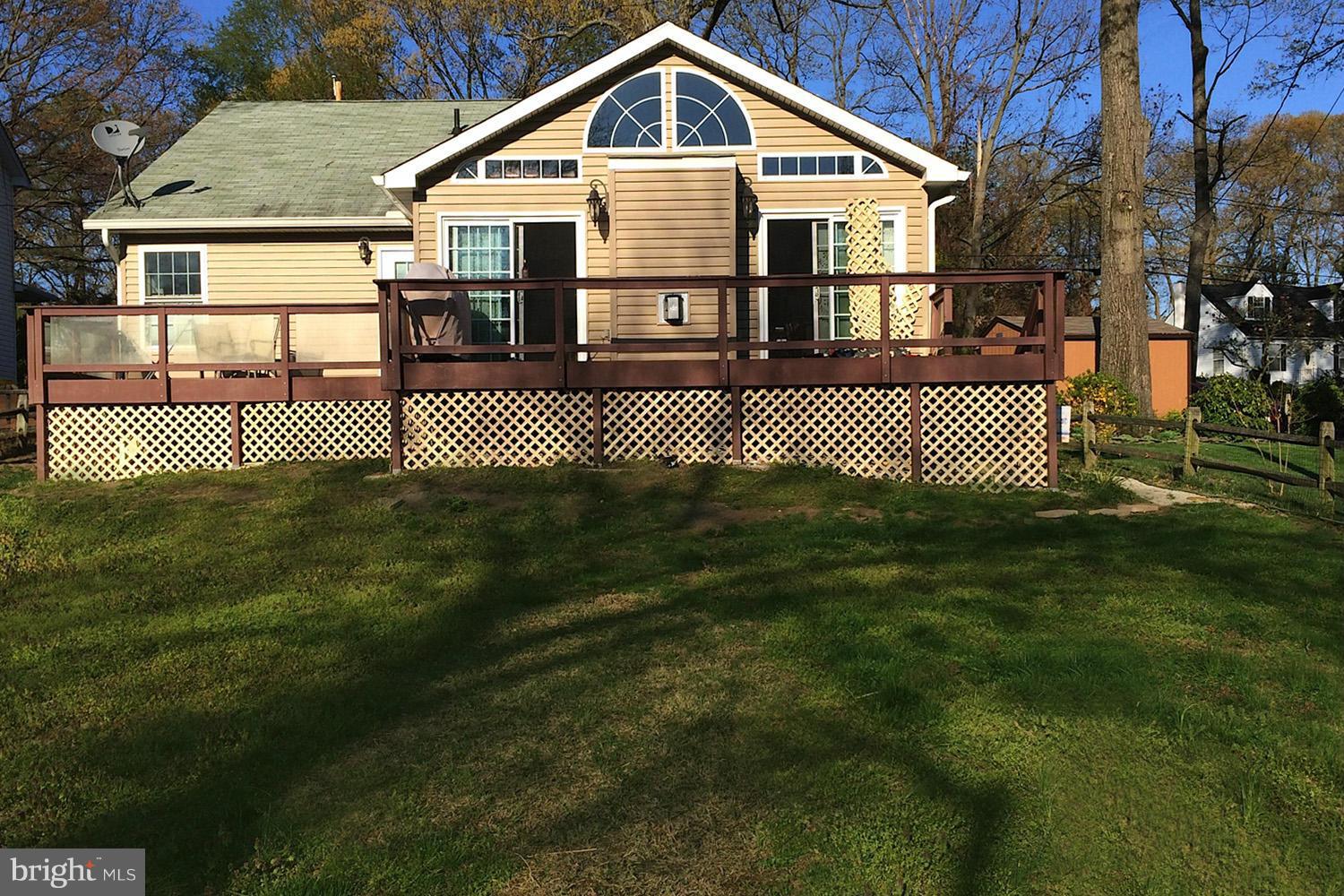 8366 Country Life Road Pasadena, MD 21122 - Photo 5 of 30 Waterfront Entertaining Deck Spanning Rear