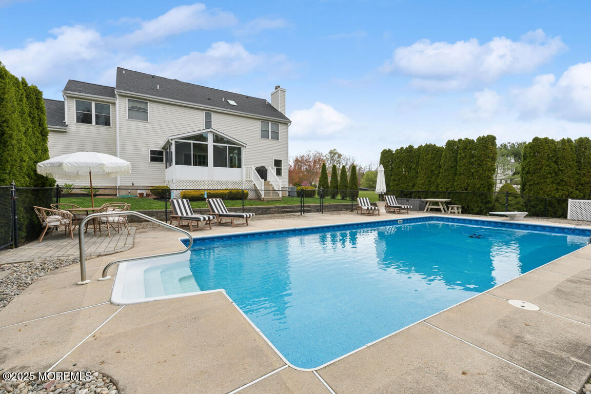 5 Trotter Way Cream Ridge, NJ 08514 - Photo 36 of 39 a view of a swimming pool with lounge chair
