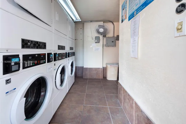 a view of a washer and dryer in a utility room