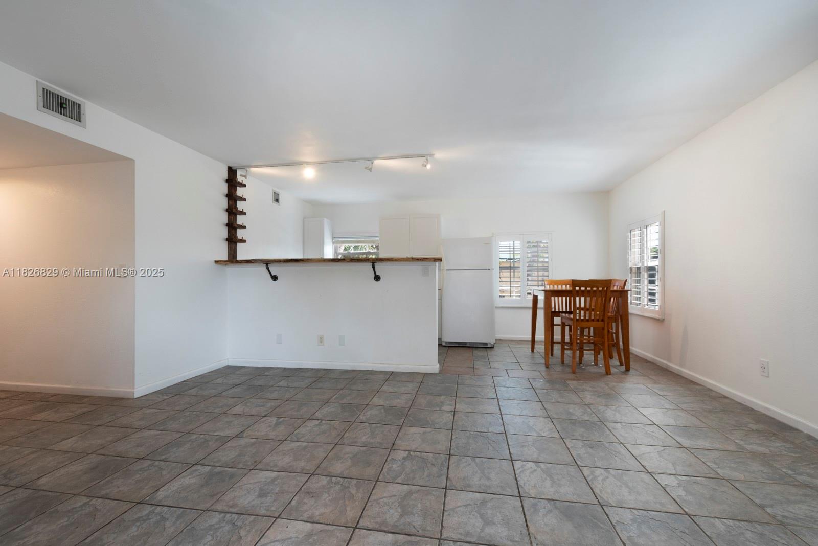 1405 Miami Road, Unit 20 Fort Lauderdale, FL 33316 - Photo 7 of 18 a view of kitchen and utility room
