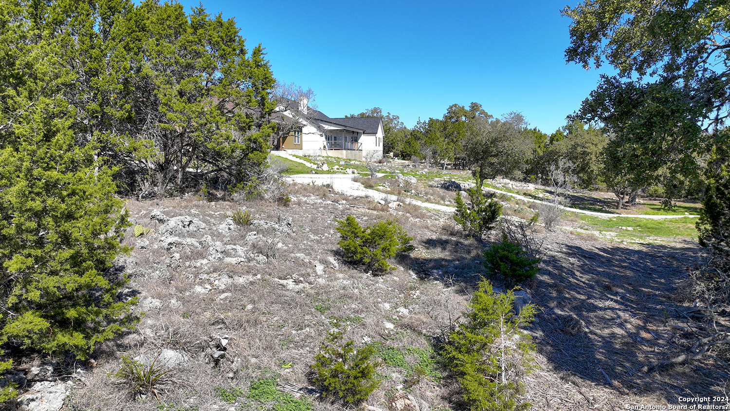 149 Alondra Lane Spring Branch, TX 78070 - Photo 23 of 46 a view of a pathway with a yard