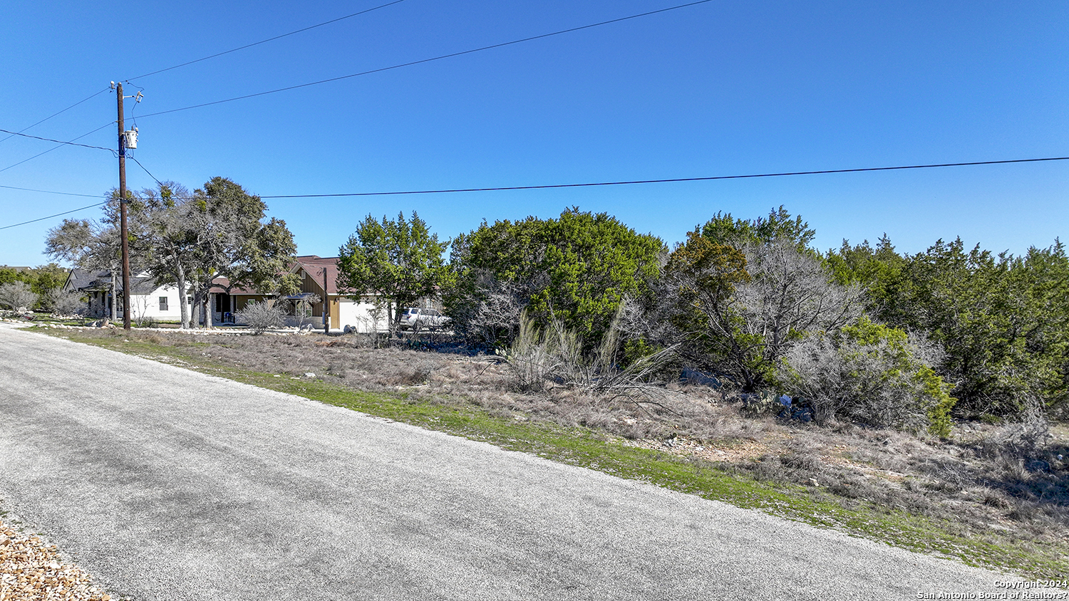 149 Alondra Lane Spring Branch, TX 78070 - Photo 25 of 46 a backyard of a house with lots of green space