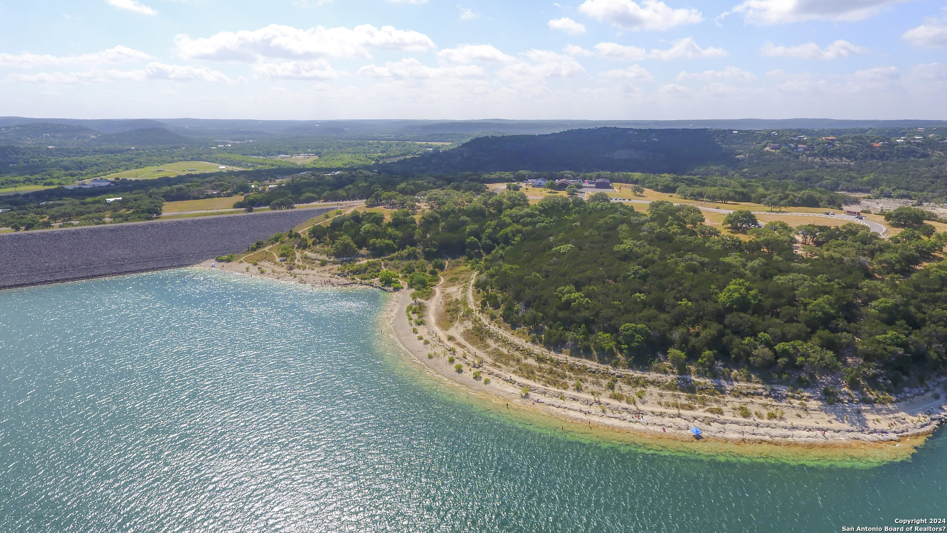 149 Alondra Lane Spring Branch, TX 78070 - Photo 36 of 46 a view of a lake with a yard