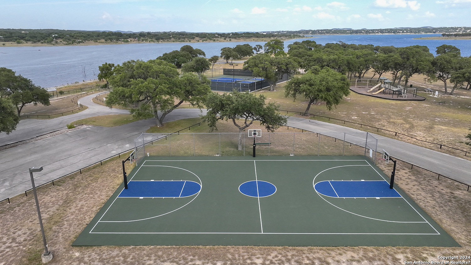 149 Alondra Lane Spring Branch, TX 78070 - Photo 43 of 46 a view of a tennis court