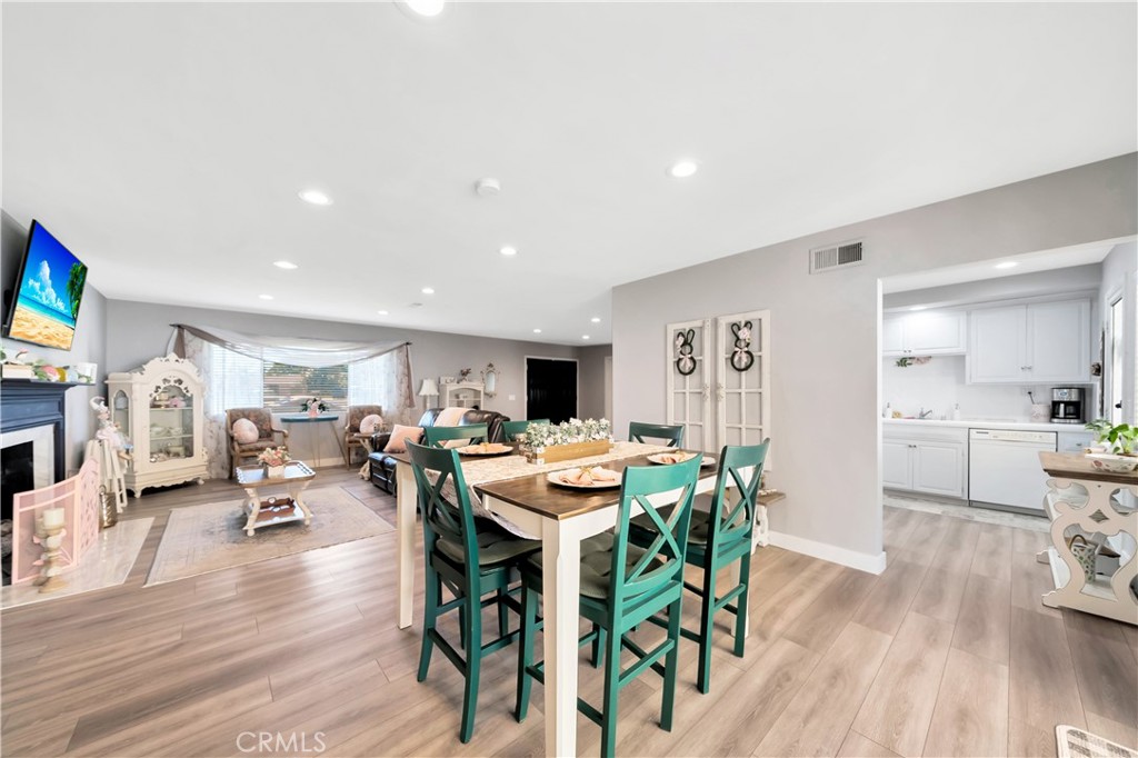 1543 East Fairway Drive Orange, CA 92866 - Photo 10 of 49 a view of a dining room with furniture and wooden floor