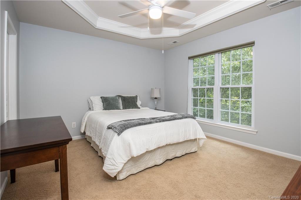 1068 Drayton Court Fort Mill, SC 29708 - Photo 16 of 37 a bedroom with a bed and a window