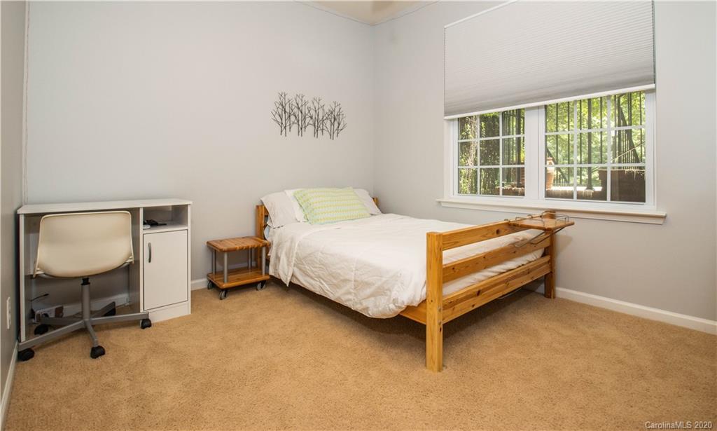 1068 Drayton Court Fort Mill, SC 29708 - Photo 18 of 37 a bed room with a bed chair and a window