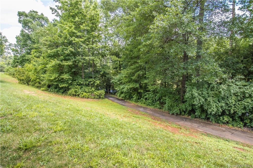 1068 Drayton Court Fort Mill, SC 29708 - Photo 23 of 37 a view of a yard with a trees