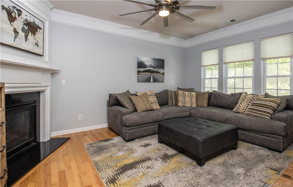 1068 Drayton Court Fort Mill, SC 29708 - Photo 4 of 37 a living room with furniture and a fireplace