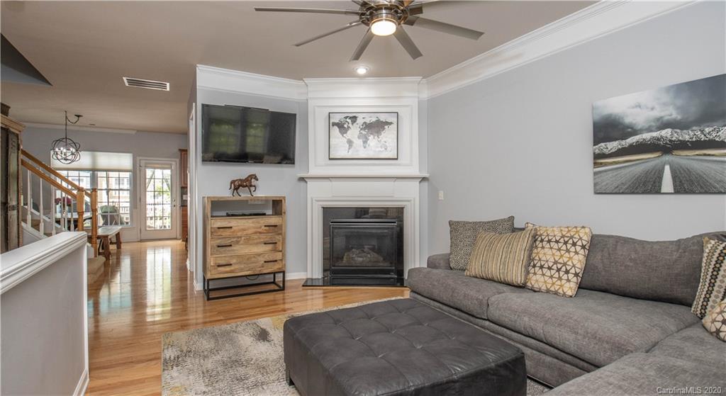 1068 Drayton Court Fort Mill, SC 29708 - Photo 5 of 37 a living room with furniture and a fireplace