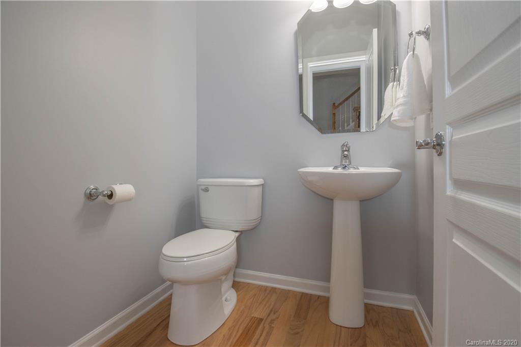 1068 Drayton Court Fort Mill, SC 29708 - Photo 10 of 37 a bathroom with a toilet sink and mirror