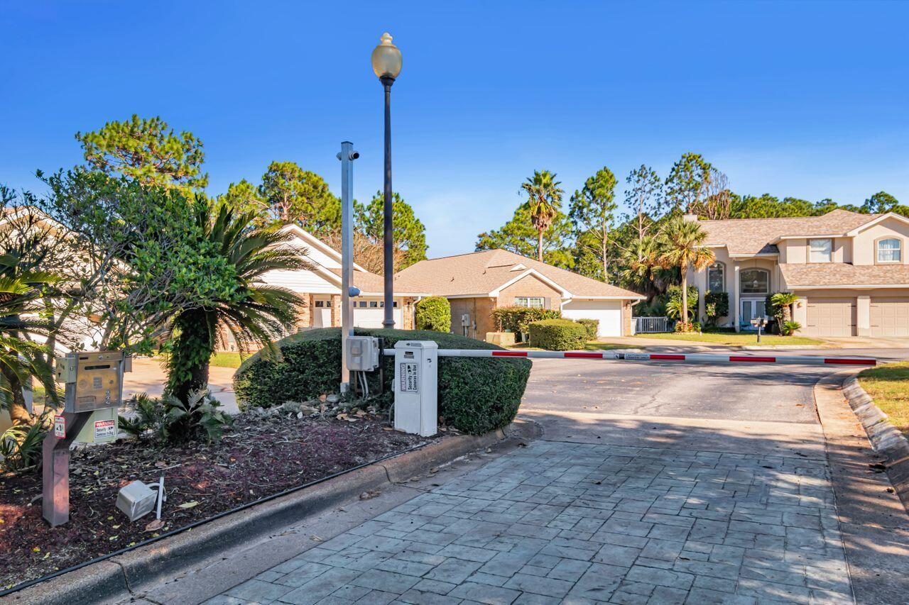9761 Leeward Way Navarre, FL 32566 - Photo 42 of 43 a view of a house with basketball court