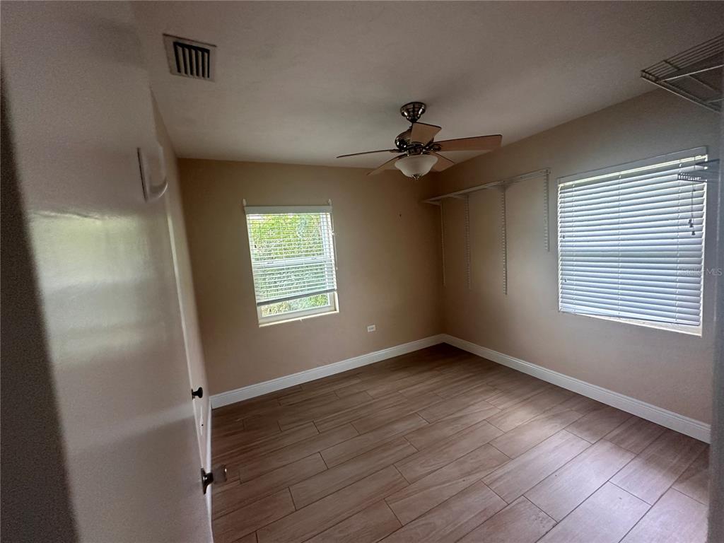 608 Southeast 30th Avenue Ocala, FL 34471 - Photo 6 of 10 a view of an empty room with a window