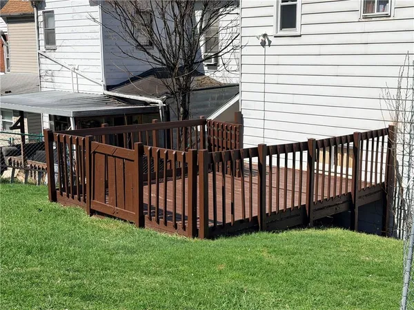 a view of a backyard with a garden