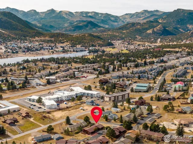 an aerial view of residential houses and city view