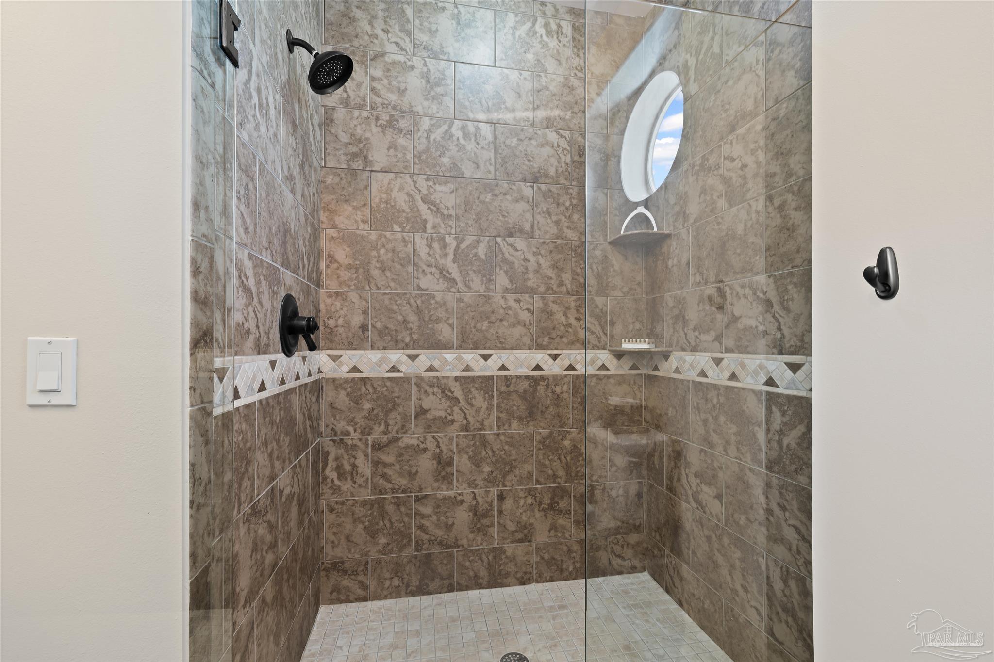 1299 Fort Pickens Road, Unit 10 Pensacola Beach, FL 32561 - Photo 24 of 58 a bathroom with a shower