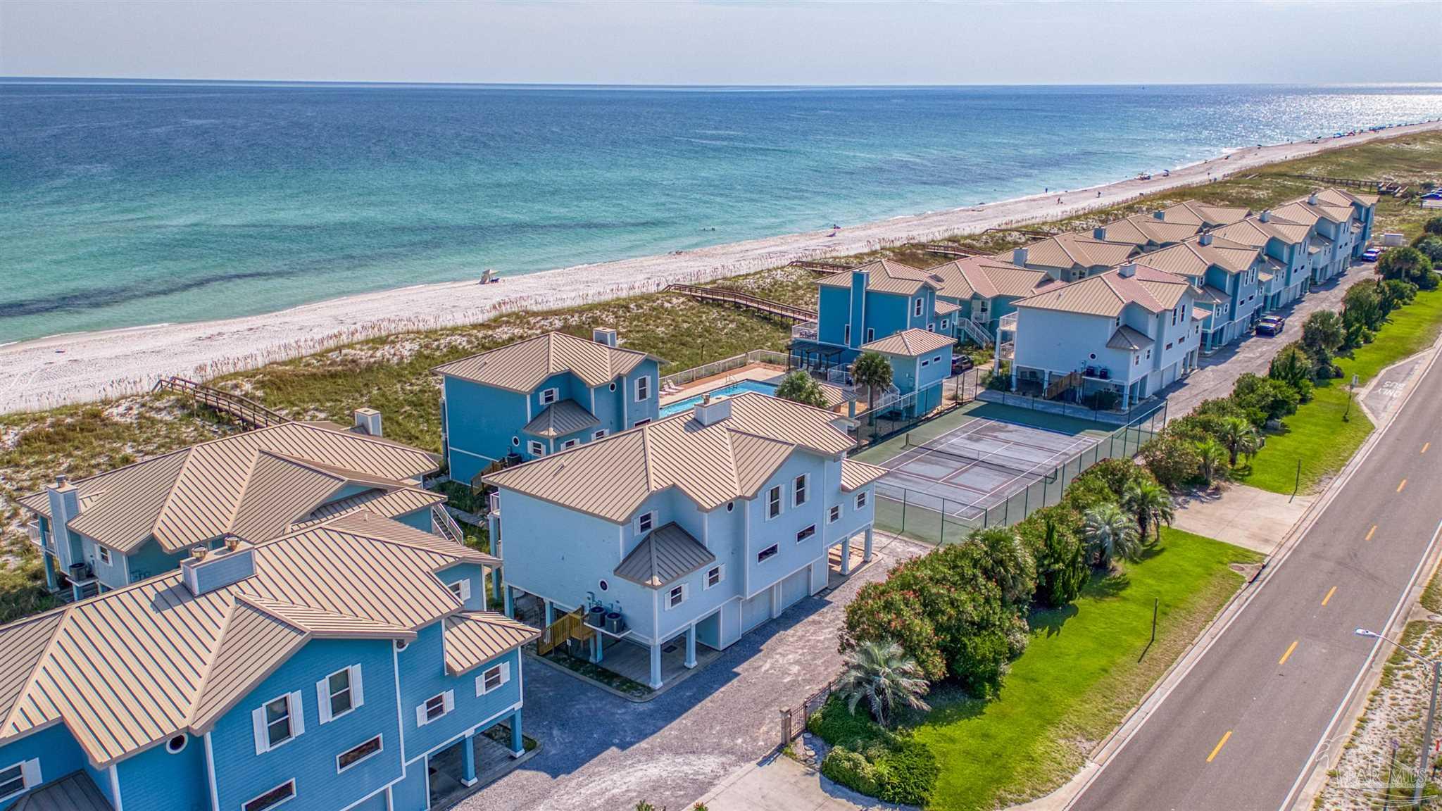 1299 Fort Pickens Road, Unit 10 Pensacola Beach, FL 32561 - Photo 51 of 58 an aerial view of residential house with outdoor space and ocean view