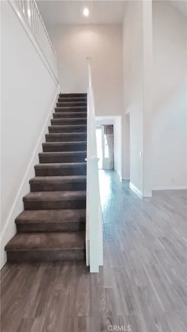 a view of entryway with stairs