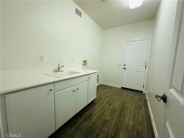 a bathroom with a sink and mirror