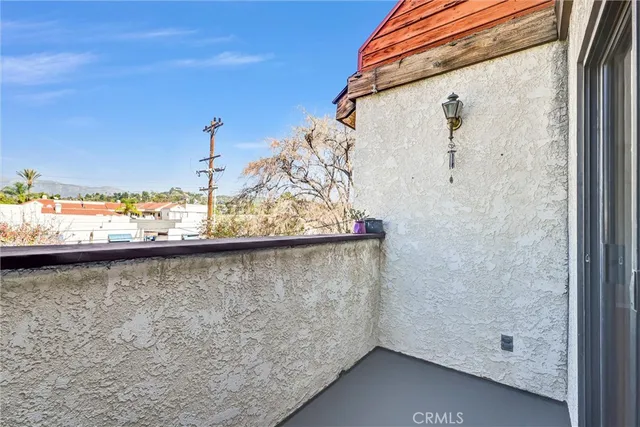 a view of a lake from a balcony