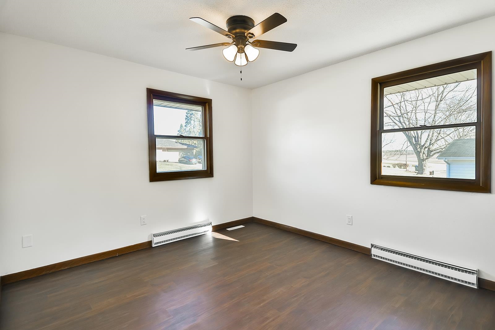 8567 Valley View Drive Stillman Valley, IL 61084 - Photo 12 of 36 a view of room with ceiling fan and window