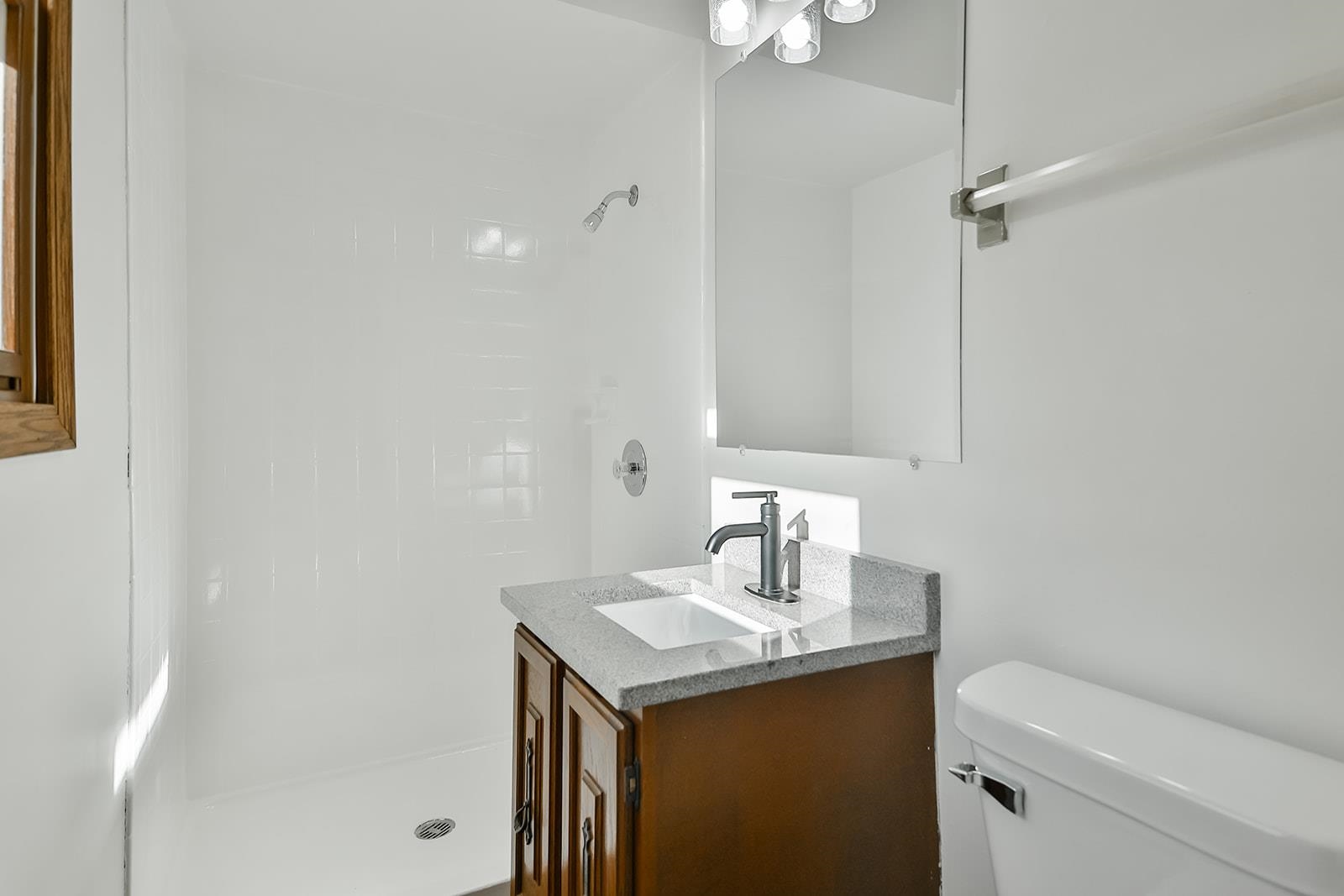 8567 Valley View Drive Stillman Valley, IL 61084 - Photo 21 of 36 a bathroom with a sink toilet and shower