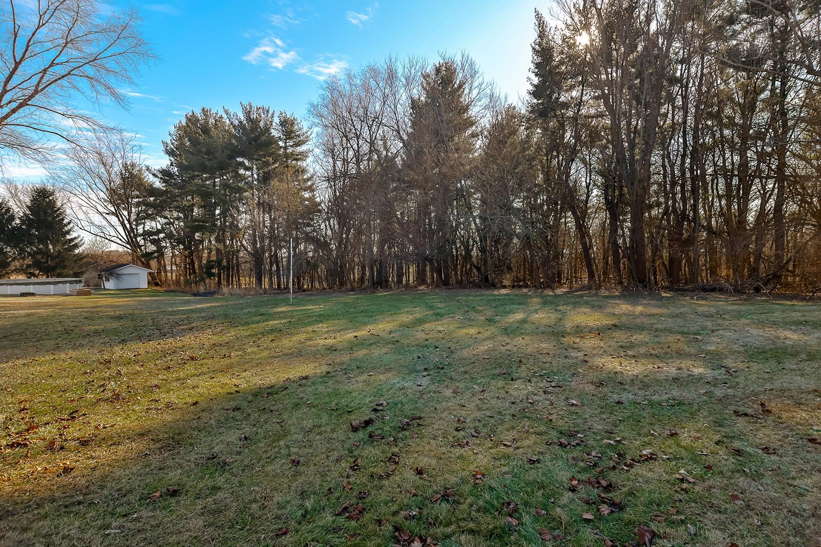 8567 Valley View Drive Stillman Valley, IL 61084 - Photo 28 of 36 a view of a field with trees in the background