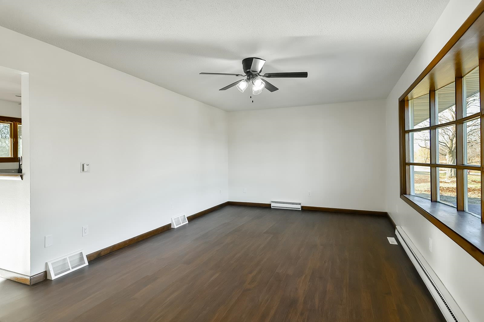 8567 Valley View Drive Stillman Valley, IL 61084 - Photo 3 of 36 wooden floor in an empty room with a window