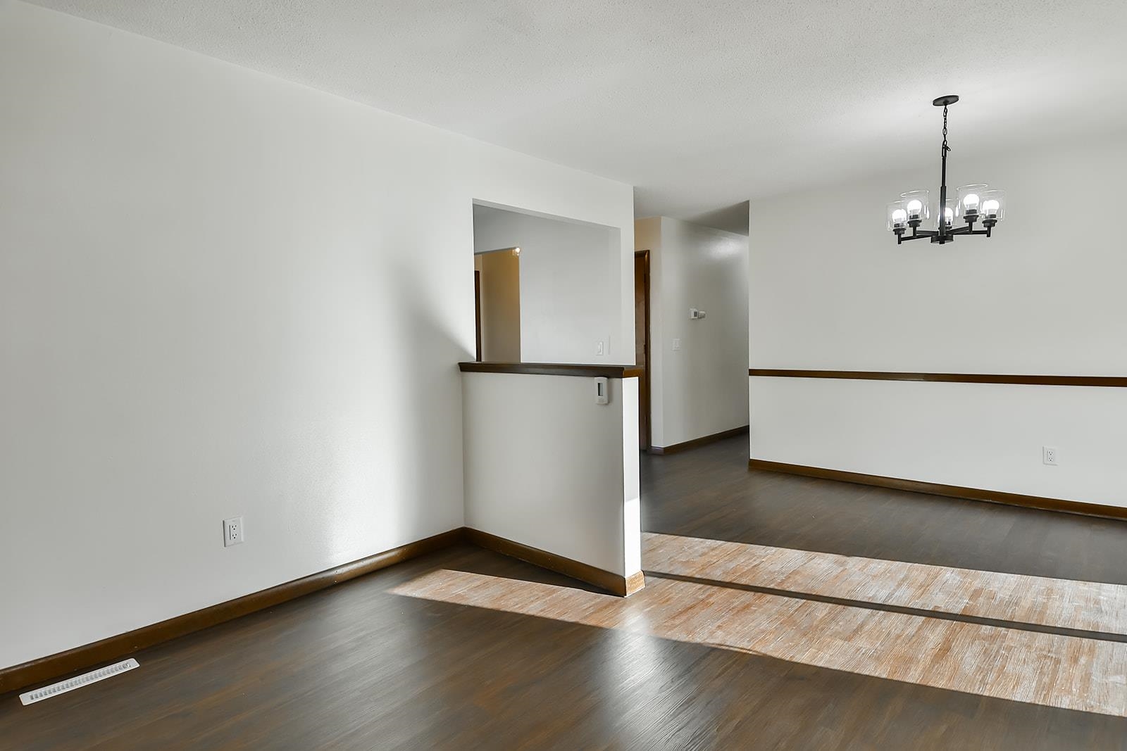 8567 Valley View Drive Stillman Valley, IL 61084 - Photo 8 of 36 an empty room with wooden floor