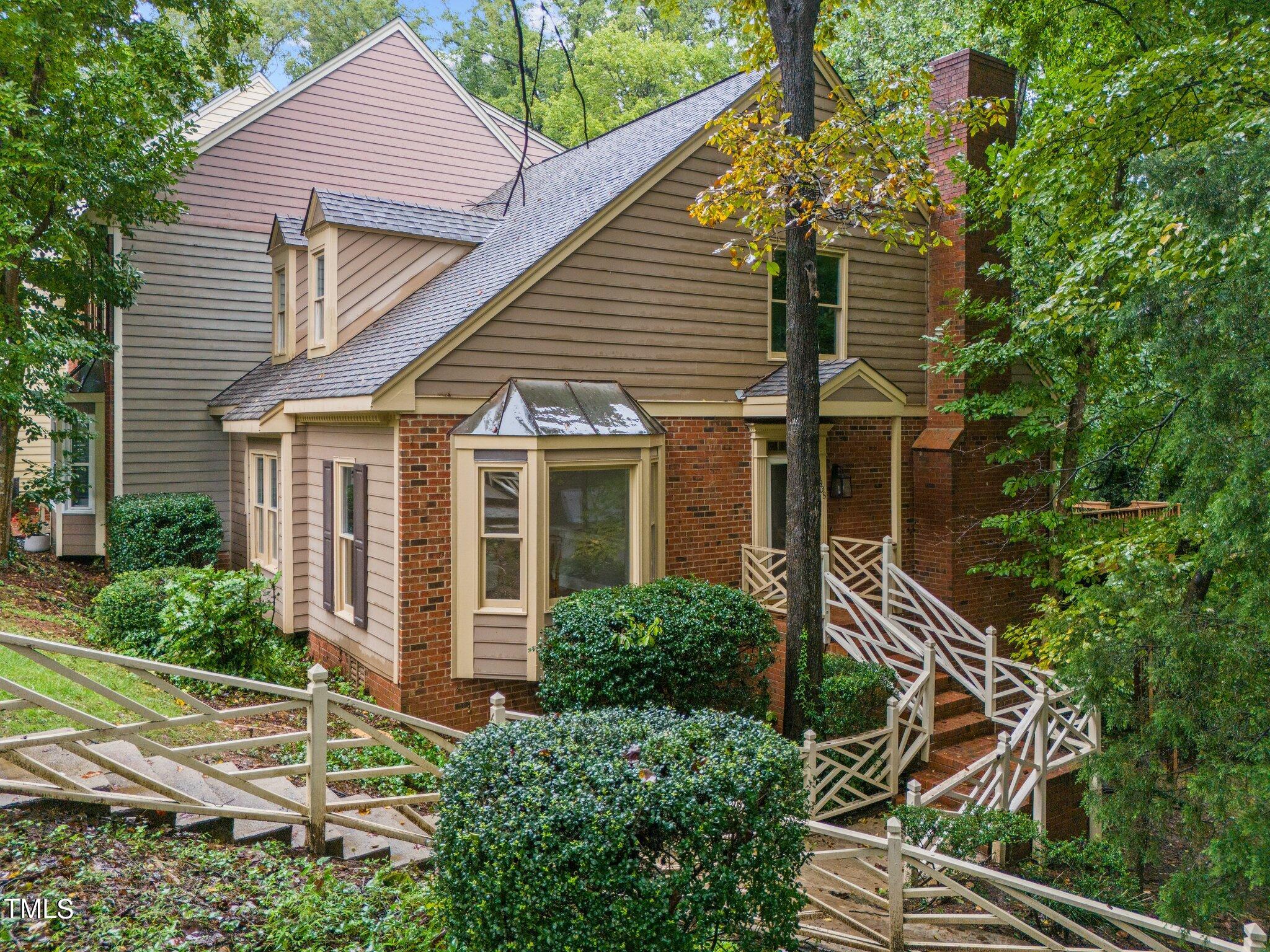 6838 Gloucester Road Raleigh, NC 27612 - Photo 3 of 36 27-web-or-mls-DJI_20240917122858_0386_D
