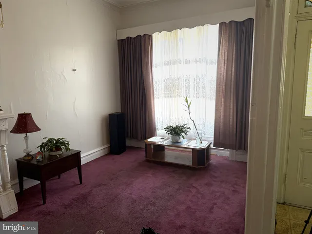 a room with furniture and window