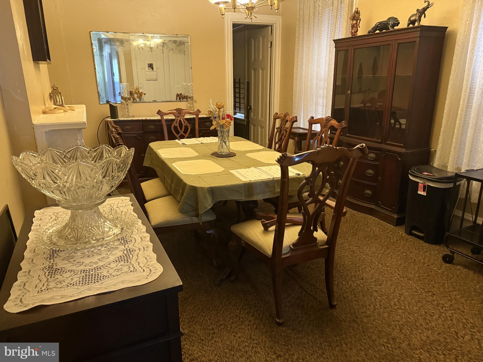 2136 North 21st Street Philadelphia, PA 19121 - Photo 4 of 17 a view of a dining room with furniture and a mirror