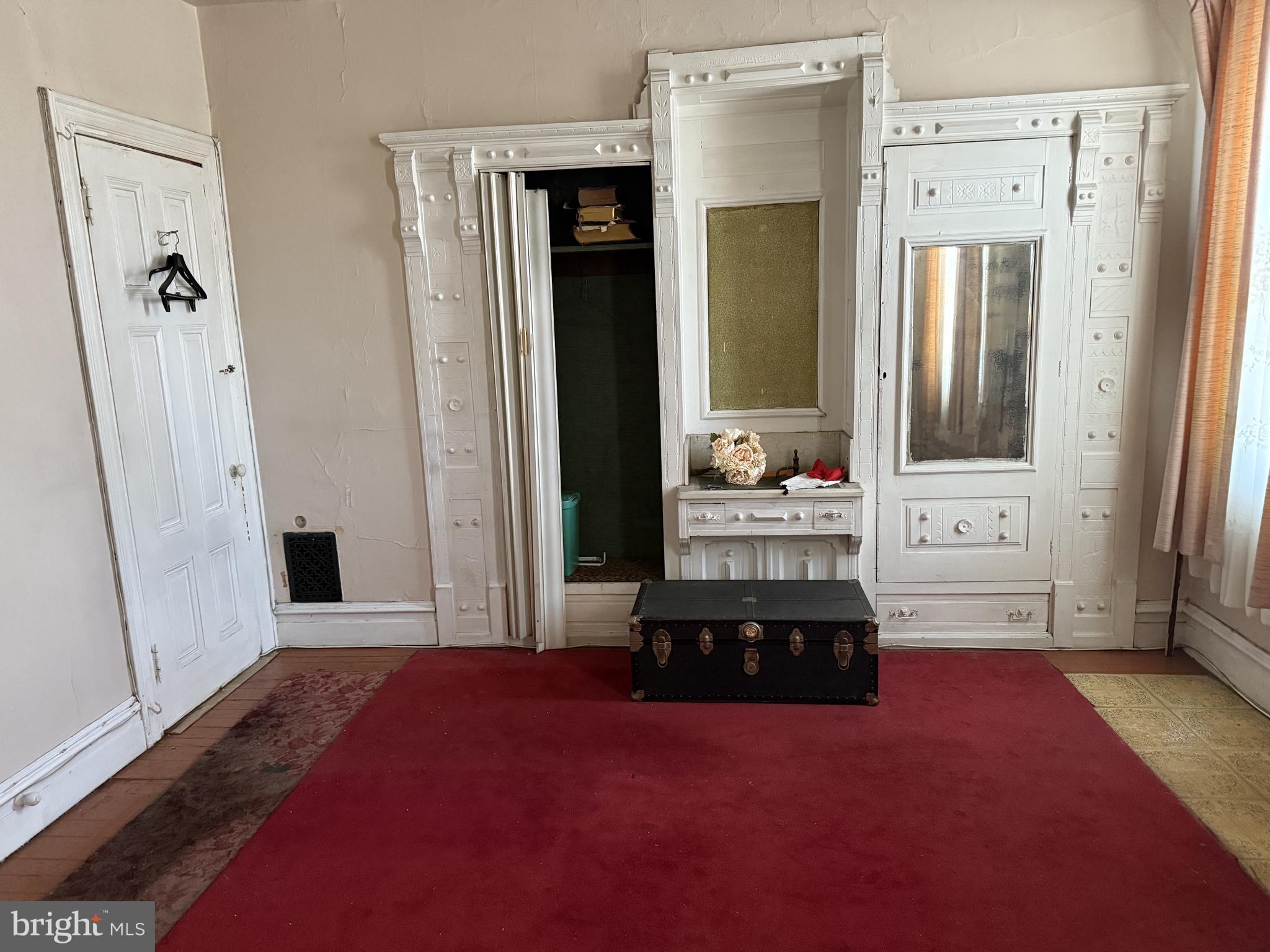 2136 North 21st Street Philadelphia, PA 19121 - Photo 9 of 17 a bedroom with a bed and a window in it